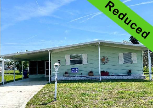 Ellenton, FL Mobile Home for Sale located at 7703 Lakeshore Dr Colony Cove